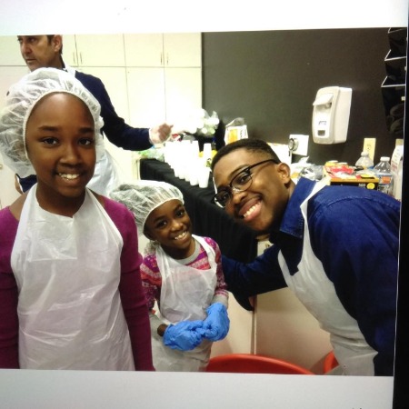Aniela Gumbs serves the community on Thanksgiving alongside her siblings.